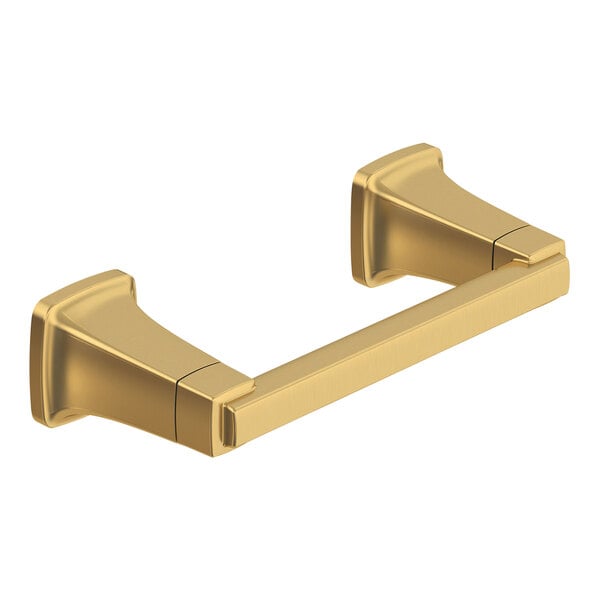 A gold American Standard Townsend toilet paper holder.