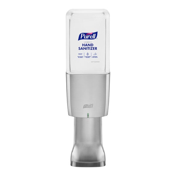 A Purell hand sanitizer dispenser with a silver and clear body.