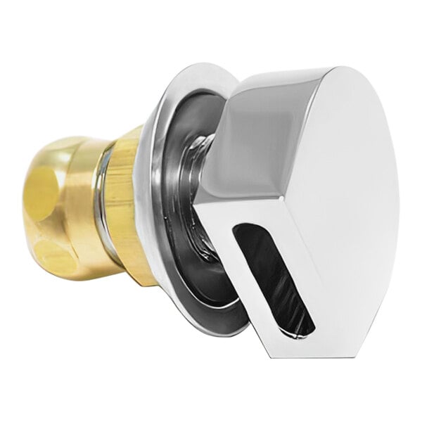 A close-up of a metal surface with a Fisher 1/2" Male Inlet Fitting.