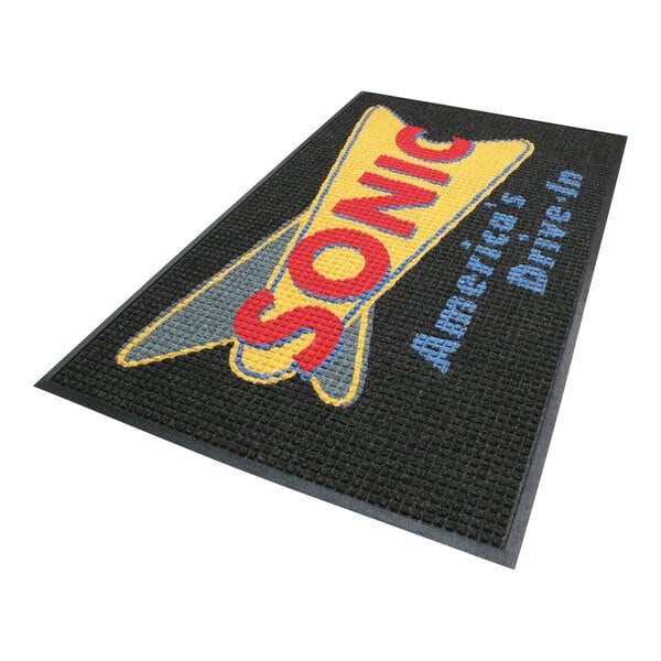A black and grey WaterHog logo mat with a sonic drive in logo.