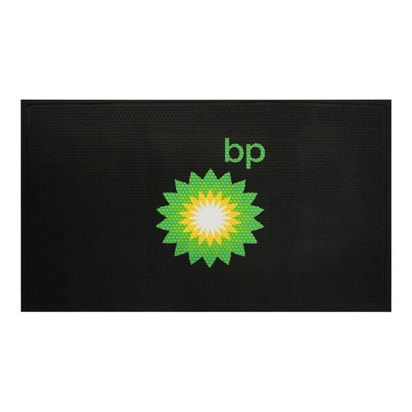 A black M+A Matting SuperScrape Impressions mat with a yellow and green flower.