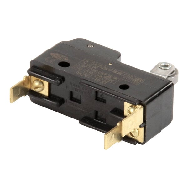 A black electrical device with gold colored screws and two wires.