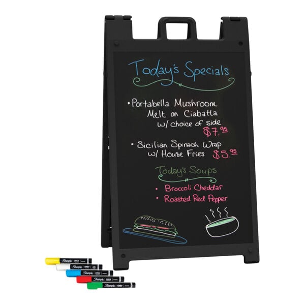 A United Visual Products black wet erase message board with writing on it used as a menu board in an Italian restaurant.