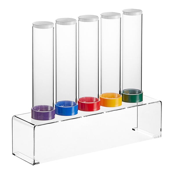 A clear plastic tube with white stand and black border containing 5 colored cones.