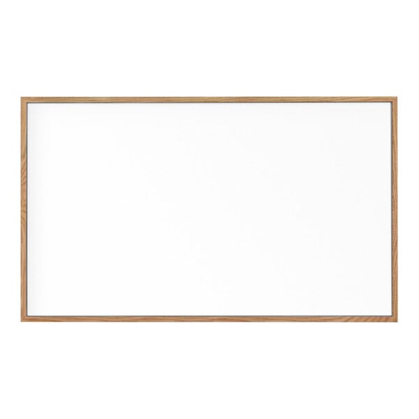 A United Visual Products whiteboard with a wooden frame.