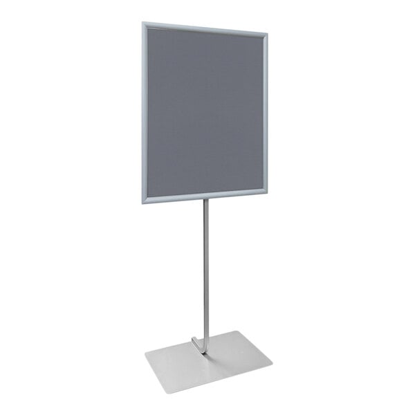 A silver metal stand with a snap frame holding a gray sign on a white board.