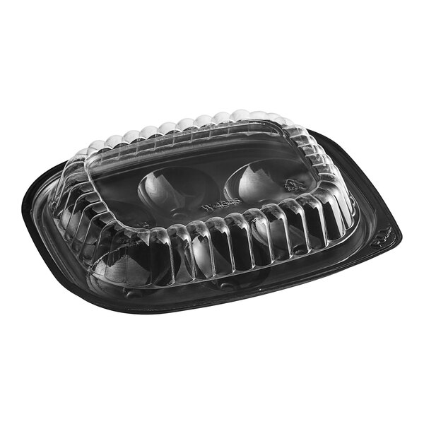 A D&W Fine Pack plastic deli container with six compartments and a clear lid.