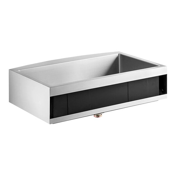 A stainless steel American Standard Pekoe farmhouse sink with a black panel.