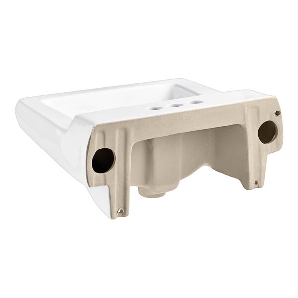 A white American Standard wall-mount bathroom sink with holes for a faucet and drain.