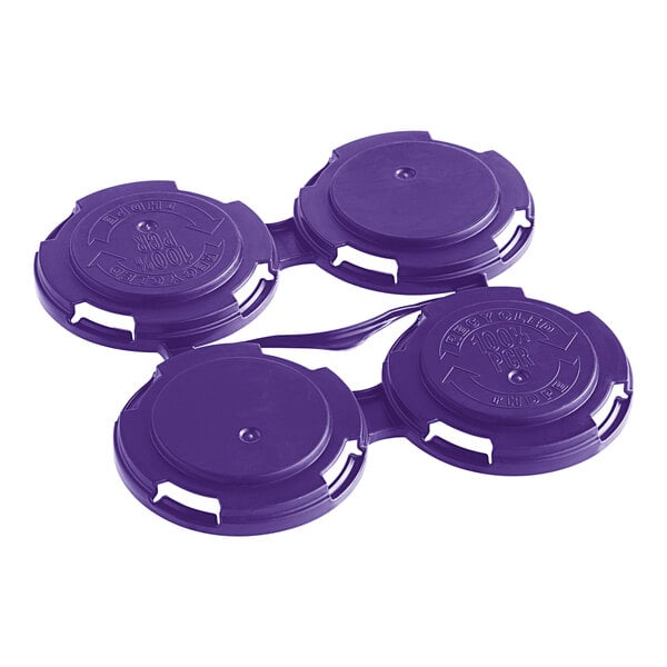 A purple PakTech plastic 4-pack can carrier with four round holes.
