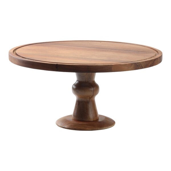 A Tablecraft round acacia wood cake stand with a pedestal.