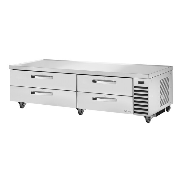 A white metal True refrigerated chef base with 4 drawers.