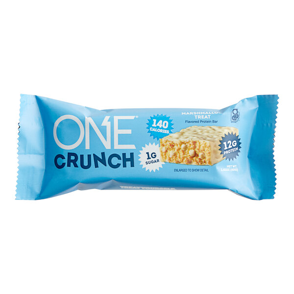 A blue ONE Crunch Marshmallow Treat protein bar in white packaging.