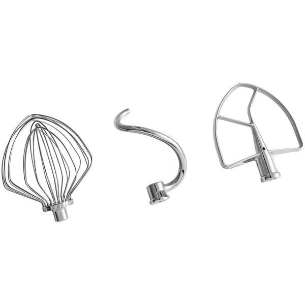A group of KitchenAid mixers with metal mixer attachments.