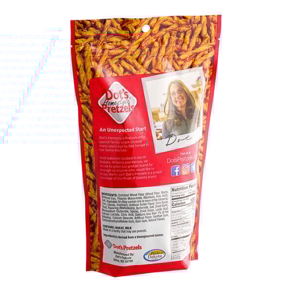 A red bag of DOT'S HOMESTYLE PRETZELS Original Seasoned Pretzel Twists with a woman on the label.