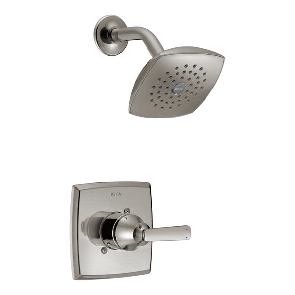 A Delta stainless steel shower and valve trim kit with a shower head and faucet.