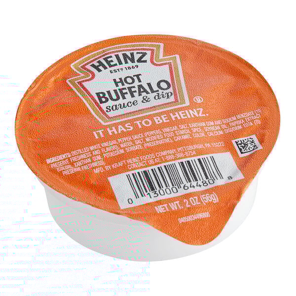 A container of Heinz Hot Buffalo Sauce.