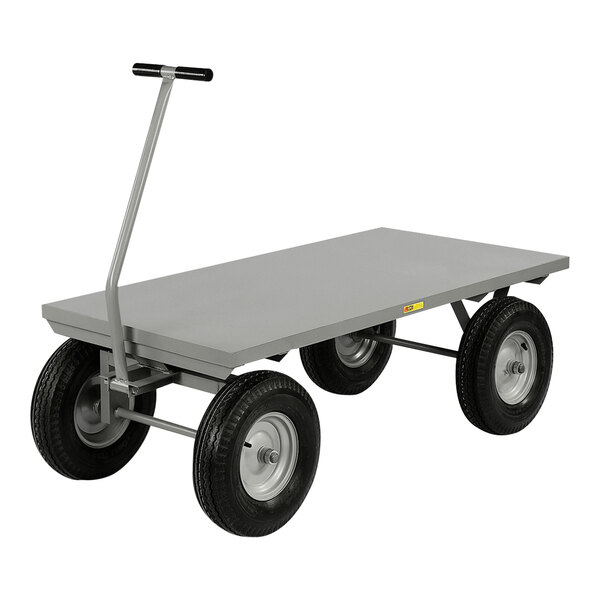 A grey Little Giant steel platform truck with black pneumatic wheels.