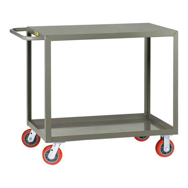 A Little Giant steel service cart with polyurethane wheels and a flush top shelf, with red wheels.