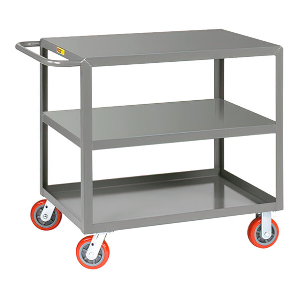 A gray Little Giant steel service cart with two shelves and 6" polyurethane wheels.