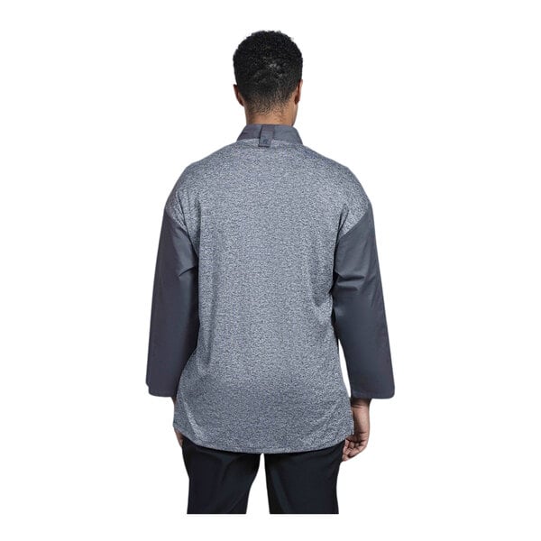The back of a Uncommon Chef grey and black chef coat with grey mesh.