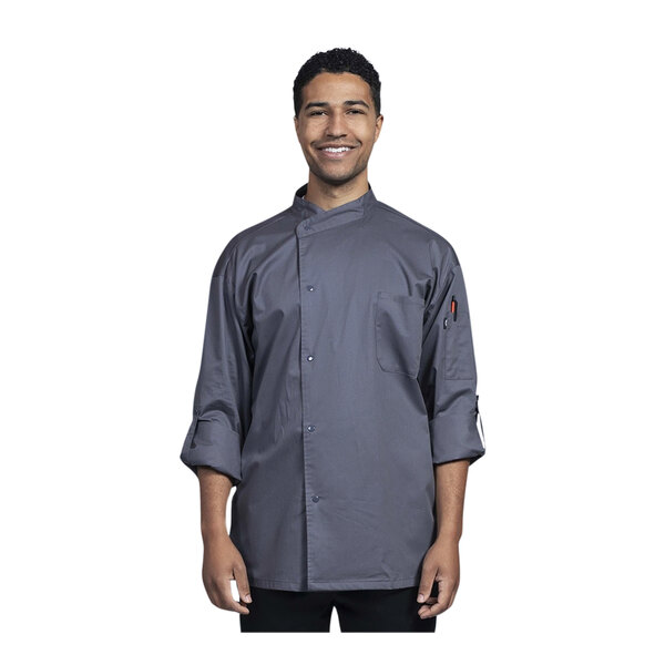 A man wearing a Uncommon Chef Pisa long sleeve chef coat with a slate mesh back.