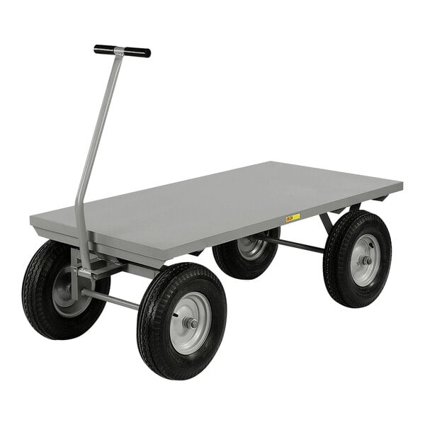 A Little Giant grey metal platform truck with black pneumatic wheels.