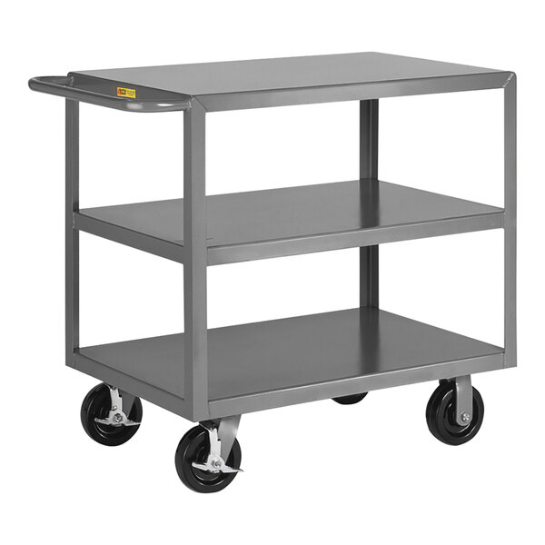 A grey metal Little Giant 3-shelf steel cart with black wheels.