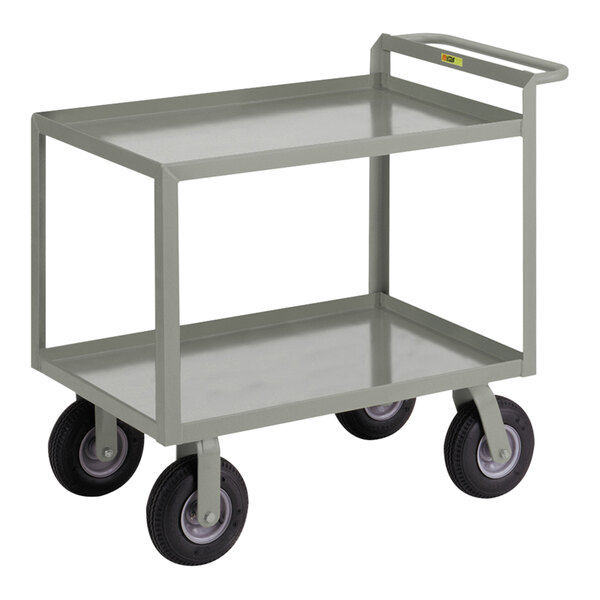 A metal Little Giant merchandise collector cart with two shelves and black pneumatic wheels.
