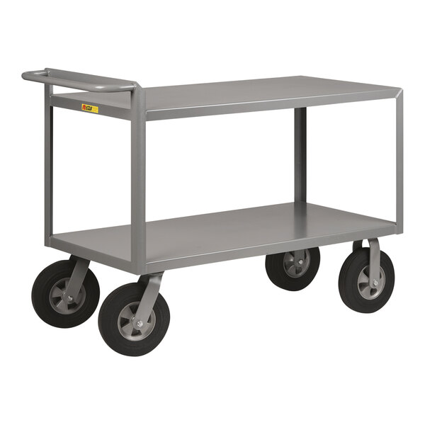 A gray metal Little Giant merchandise collector cart with black wheels.