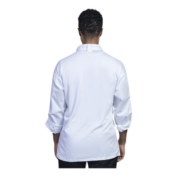 A man wearing a Uncommon Chef white convertible long sleeve chef coat with white mesh back.