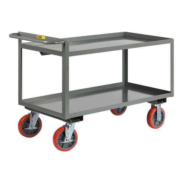 A Little Giant steel merchandise collector cart with red polyurethane wheels.