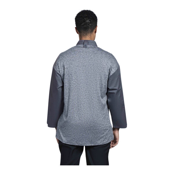 The back of a Uncommon Chef grey and black chef coat with grey mesh.