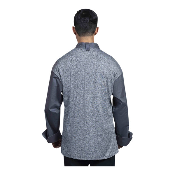 The back of a man wearing a grey Uncommon Chef Capri chef coat with a mesh back.