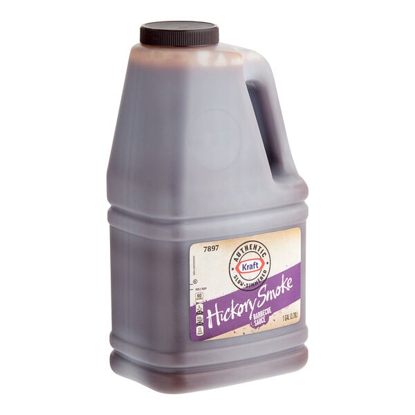 A jug of Kraft Hickory Smoke BBQ Sauce with a label.