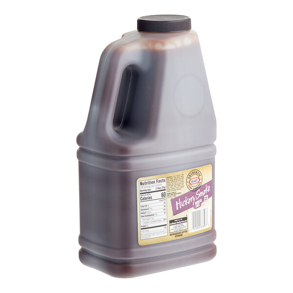 A jug of Kraft Hickory Smoke BBQ Sauce with a label.