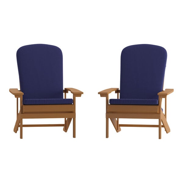 Two Flash Furniture teak Adirondack chairs with blue cushions.