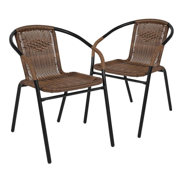 Two Flash Furniture rattan arm chairs with black metal legs on a white background.