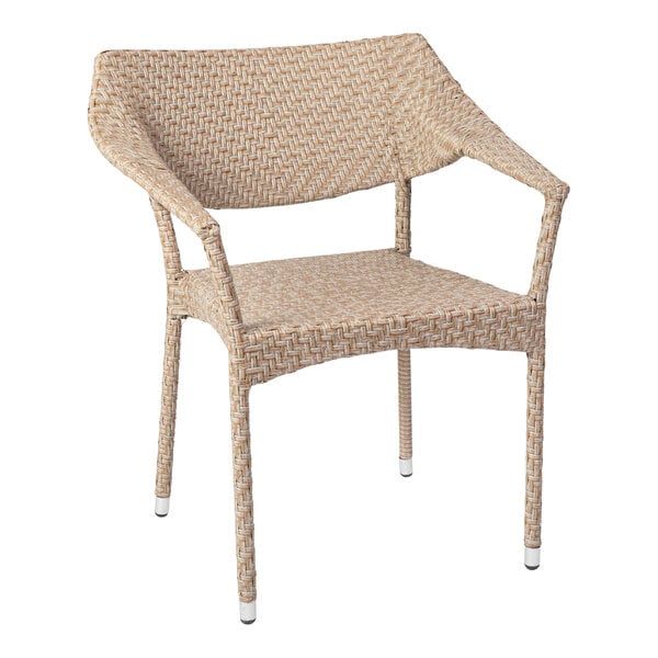 A Flash Furniture natural synthetic rattan arm chair.