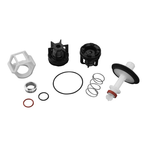 A white and black plastic Watts total repair kit with a red rubber ring.