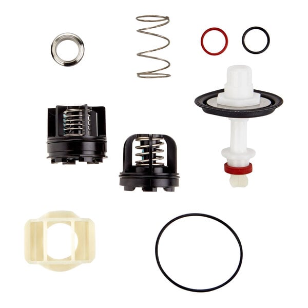 A Watts reduced pressure zone total repair kit on a counter.