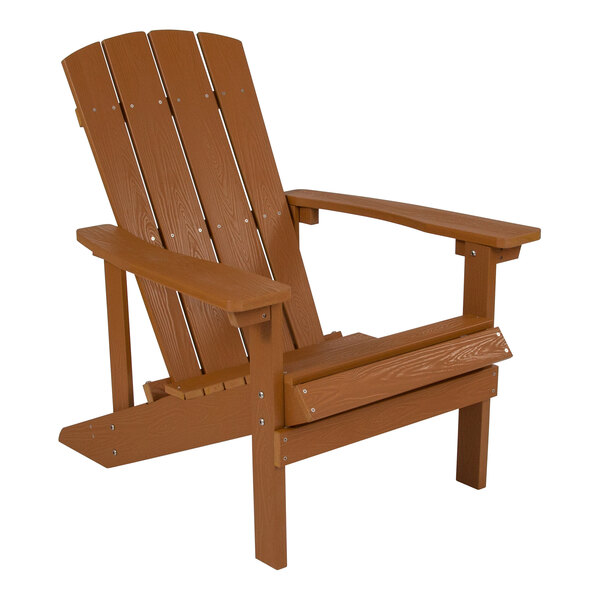 A brown teak Adirondack chair with armrests.