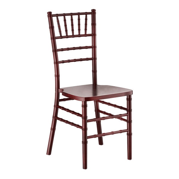 A mahogany wood Chiavari chair with a slatted back and decorative spindle detailing.
