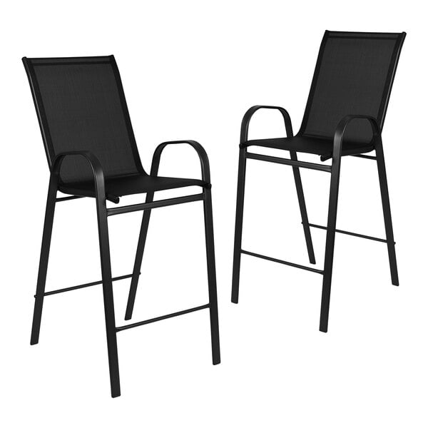 A pair of black Flash Furniture outdoor barstools with arms and a black frame.