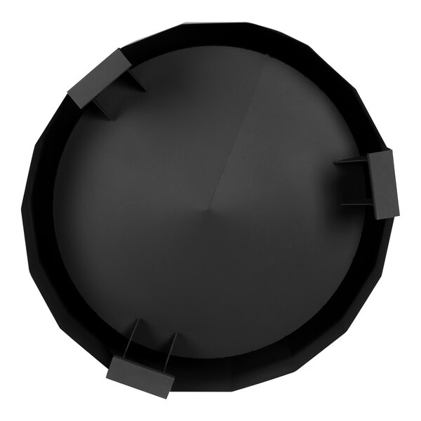 A black circular Flash Furniture fire pit with four legs.