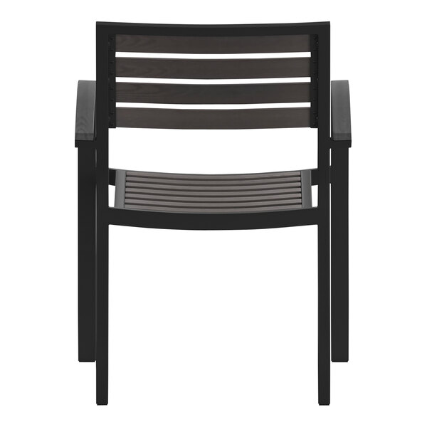 A black outdoor arm chair with a faux teak slat seat.