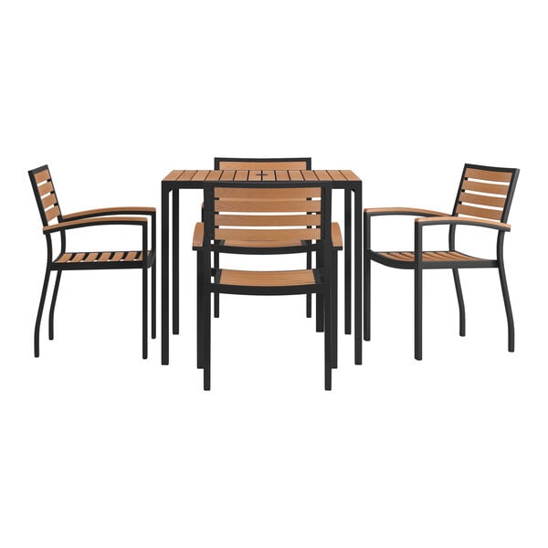 A Flash Furniture natural faux teak slat table and chair set on an outdoor patio.