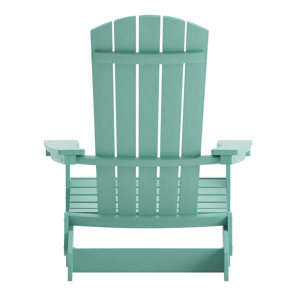 A teal faux wood folding Adirondack chair.