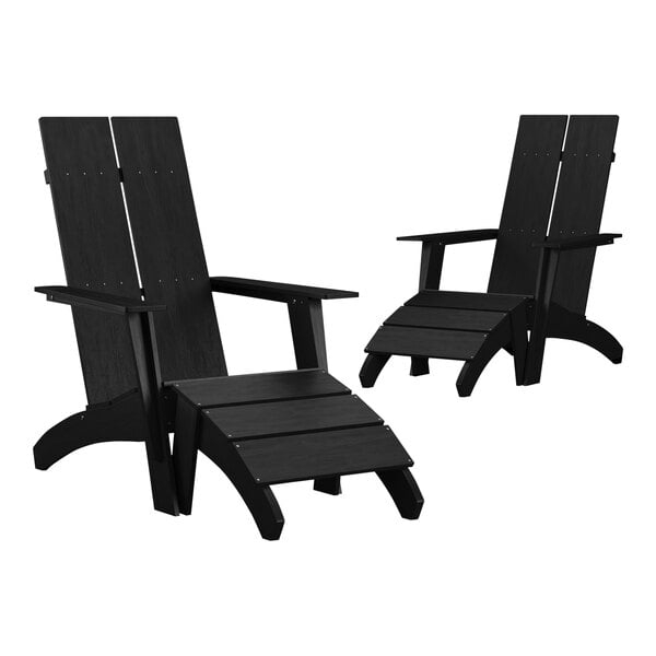Two black Flash Furniture Adirondack chairs with wooden foot rests.