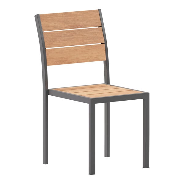 A Flash Furniture stackable outdoor chair with a wood slat back and black frame.